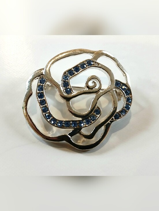 Jewelry - Elegant Floral Silvertone Brooch with Blue Crystal Accents
